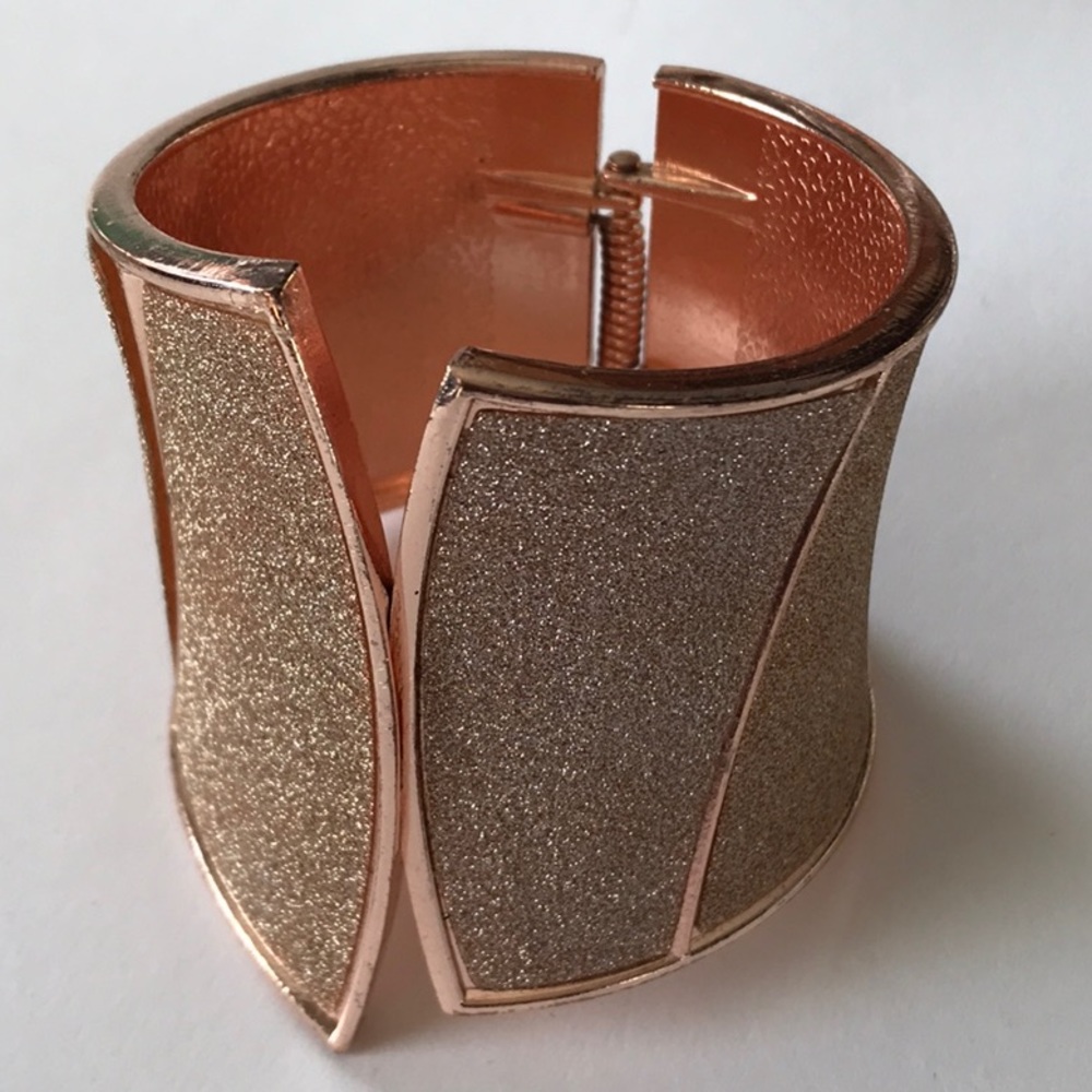 Copper tone hinge bracelet